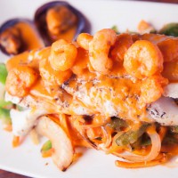 bacalao con salsa de marisco
